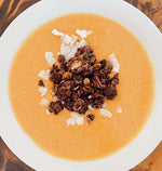 Mexican Chocolate granola served on a pumpkin smoothie bowl