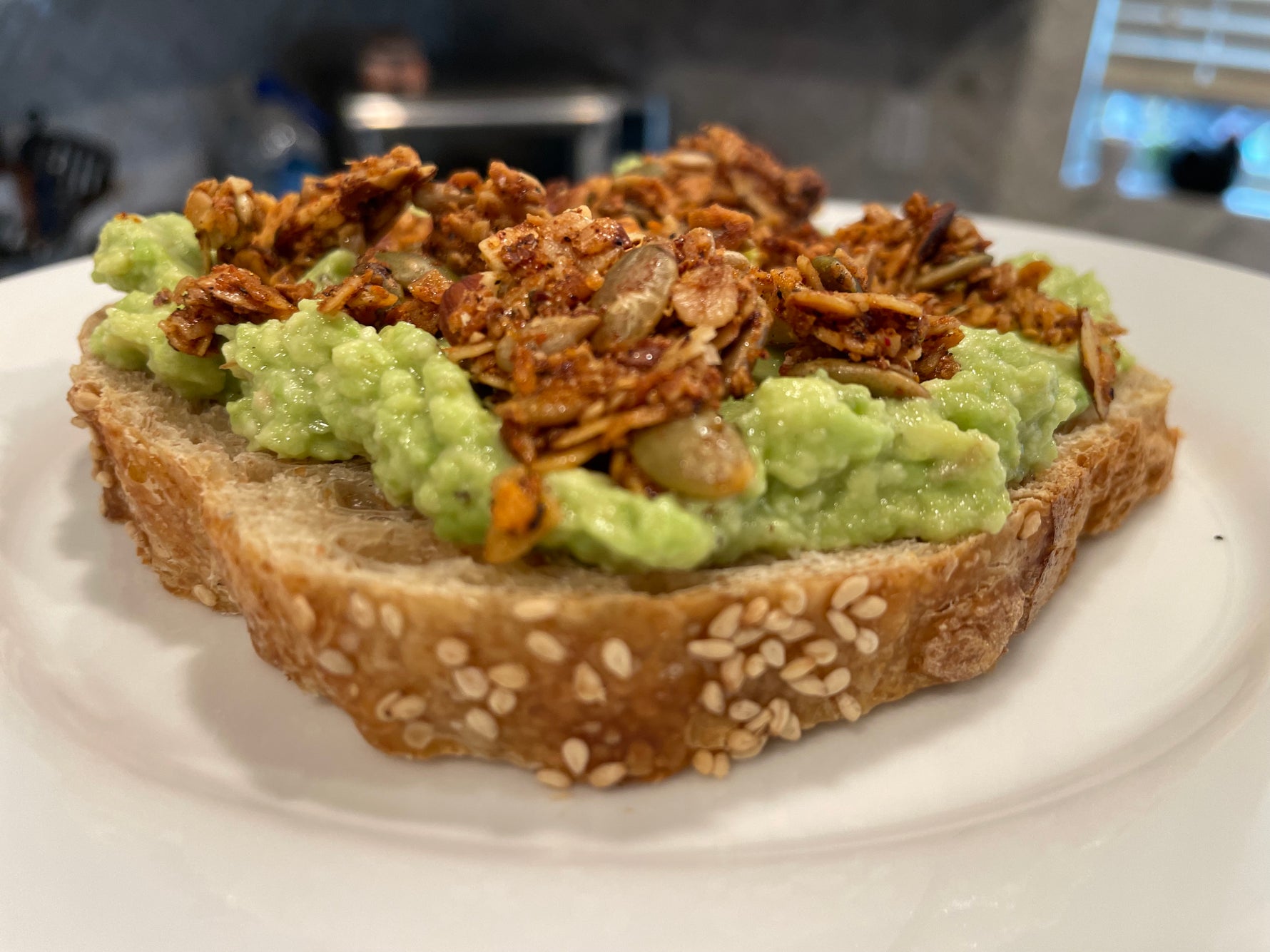 Savory Bloody Mary granola on avocado toast